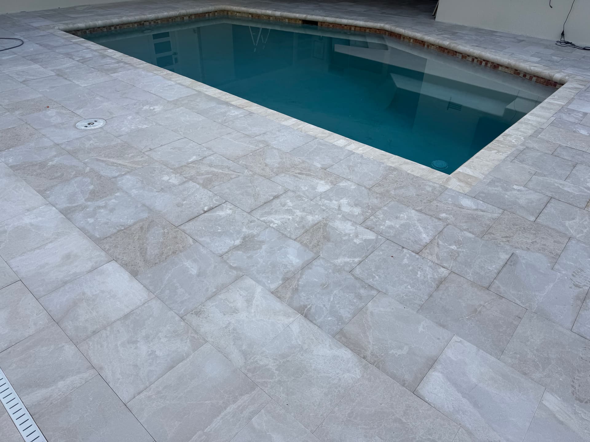 Gallery photos for Diana Royale Leathered Marble Pool Deck With Remodel Coping: Image #1