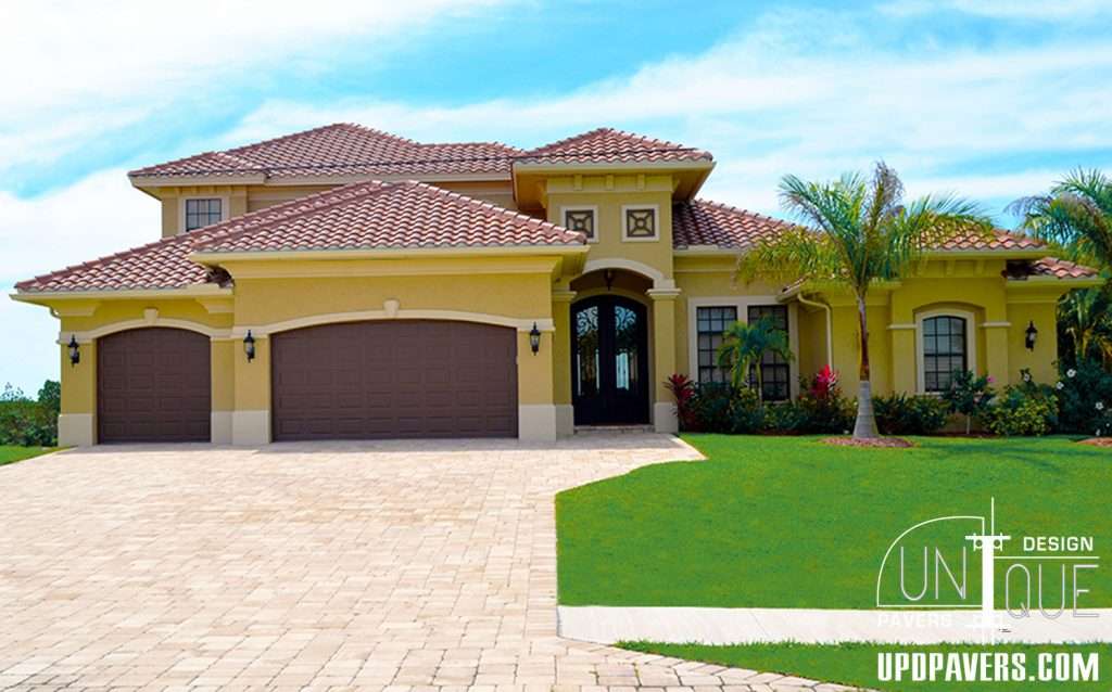 Elegant yellow house with tile roof, dual garage doors, and landscaped front yard.