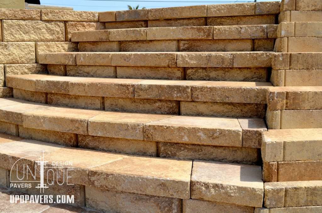 Elegant stone steps leading up, showcasing unique paver design and craftsmanship.