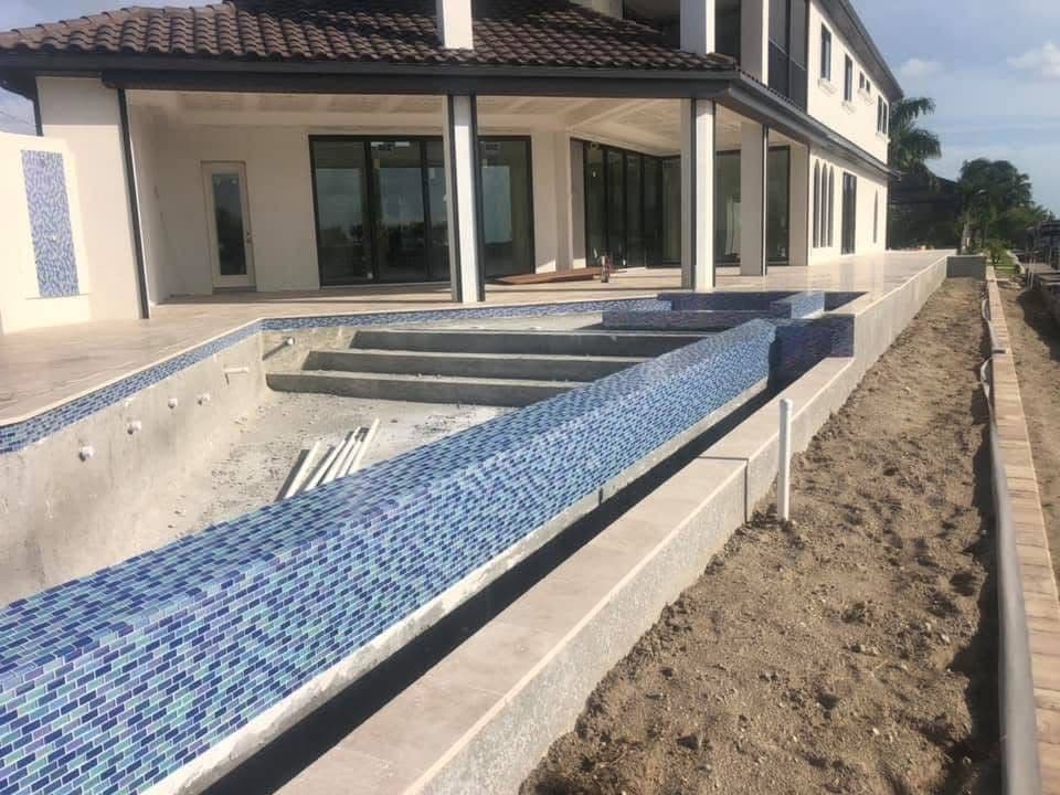 Ivory Travertine Pool Deck on a Lakefront Estate