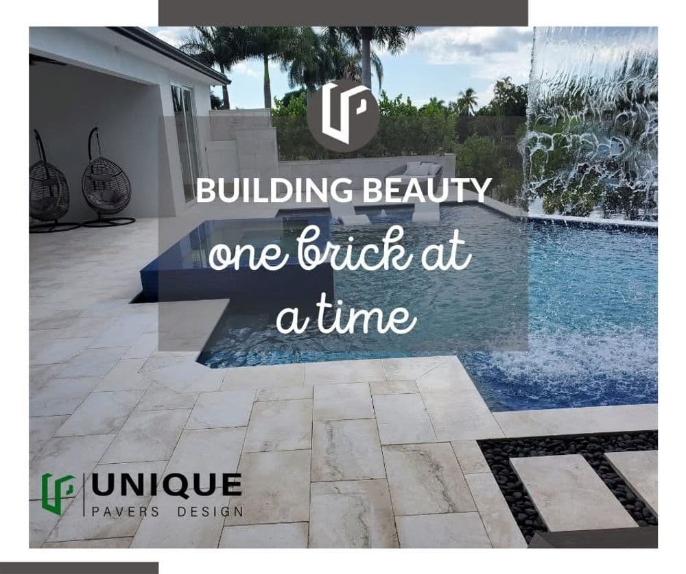 Luxury poolside with modern pavers and waterfall feature by Unique Pavers Design.