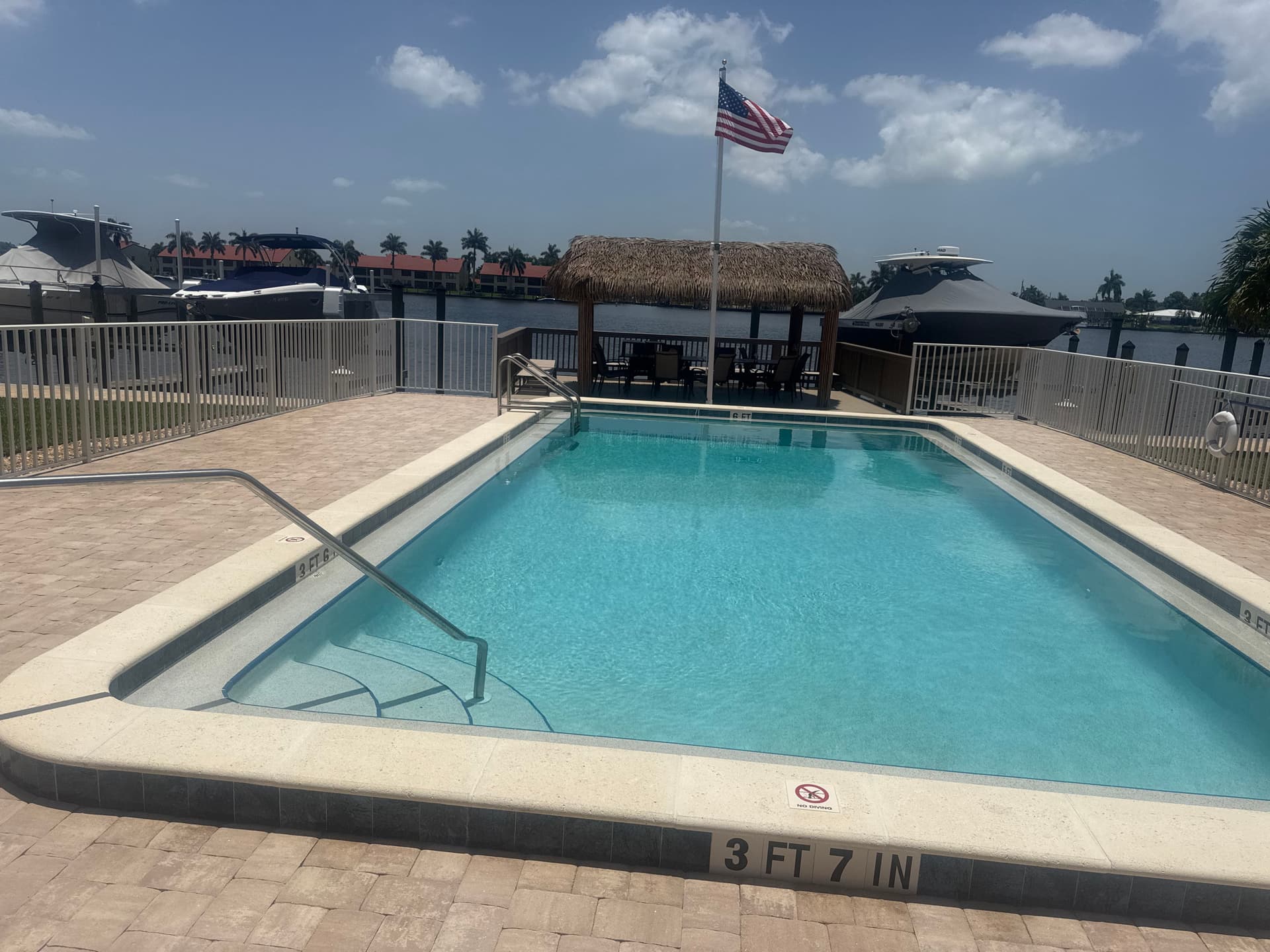 Paver Pool Deck and Captain's Walk Built for Waterfront Living image