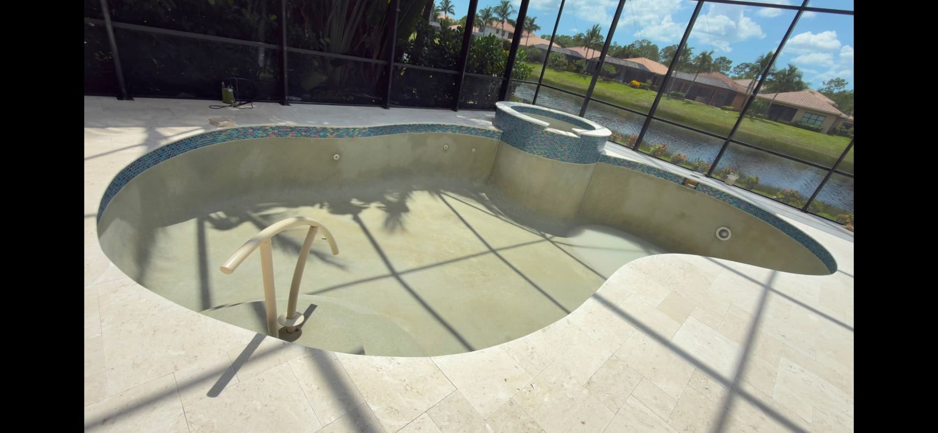 White Shell Stone Travertine and Pool Tile Upgrade for Florida Backyard image